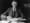Vannevar Bush seated at a desk
